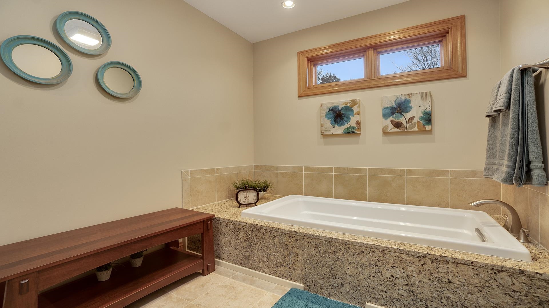 1921 Wildcat Road Dixon, IL 61021 - Photo 27 of 63 a bathroom with a tub and sink