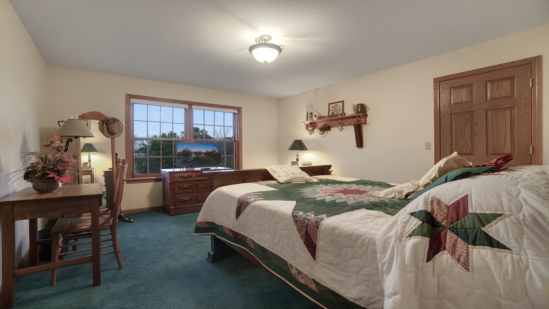 1921 Wildcat Road Dixon, IL 61021 - Photo 29 of 63 a bedroom with a bed and a window