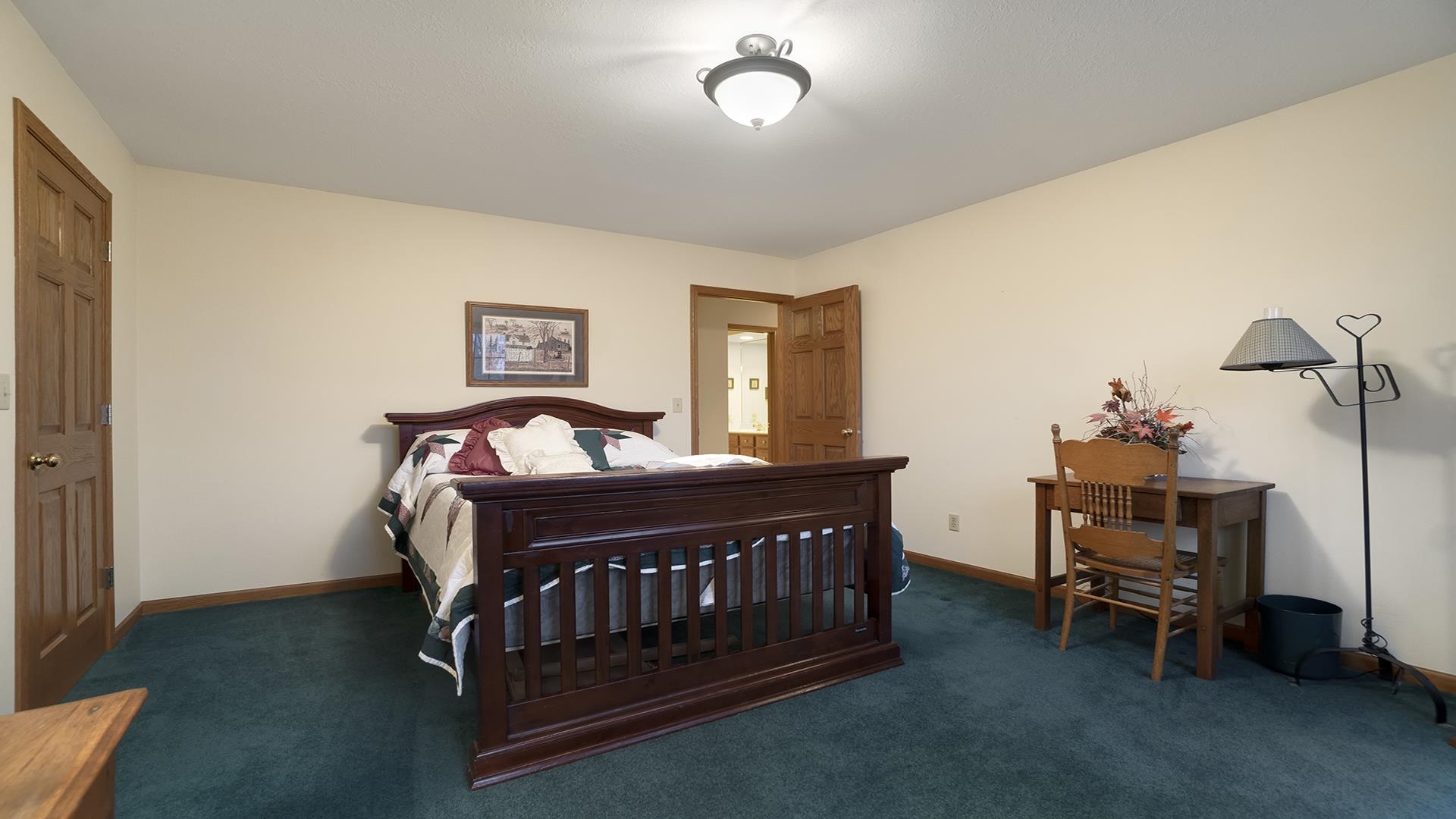 1921 Wildcat Road Dixon, IL 61021 - Photo 30 of 63 a view of a bedroom with furniture