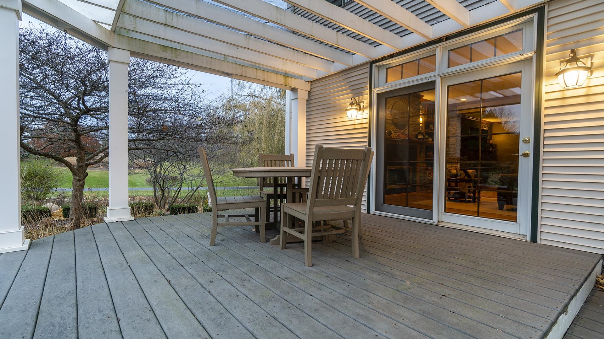 1921 Wildcat Road Dixon, IL 61021 - Photo 46 of 63 a dining space with wooden floor and outdoor space
