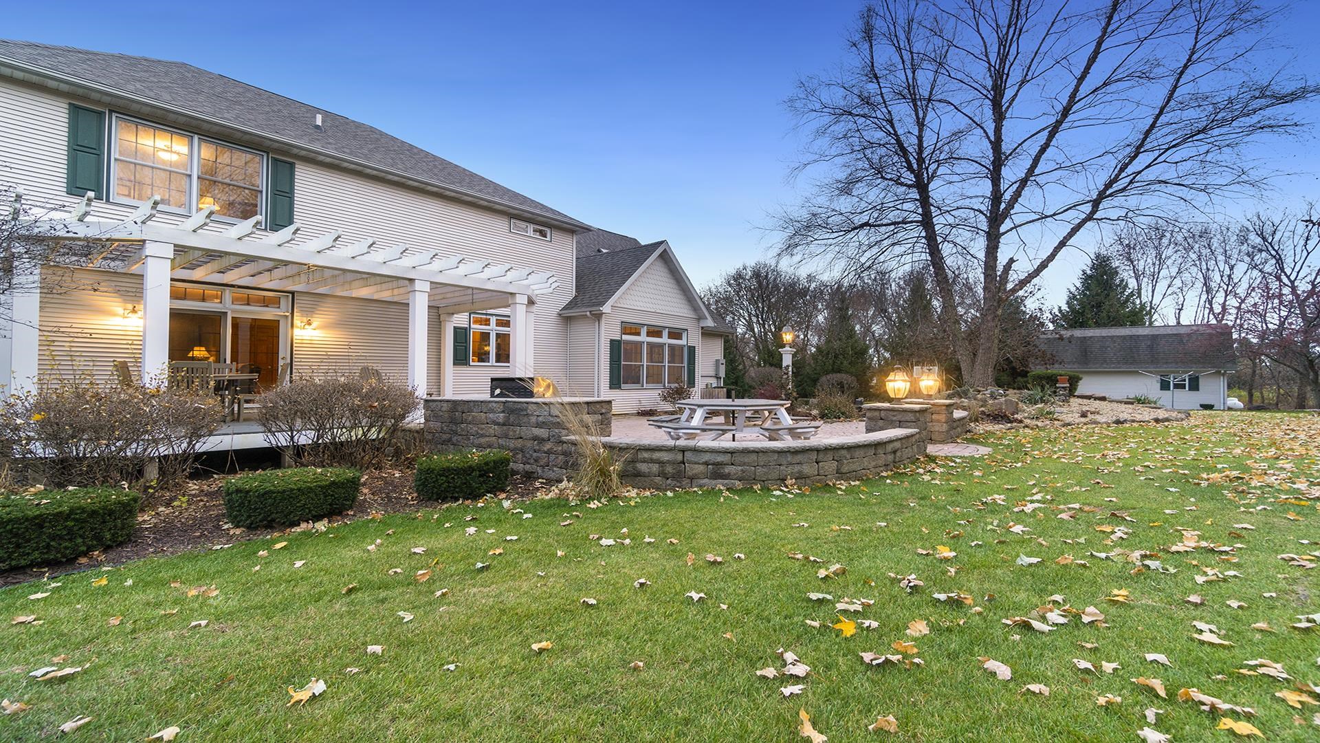 1921 Wildcat Road Dixon, IL 61021 - Photo 47 of 63 a front view of a house with garden and patio