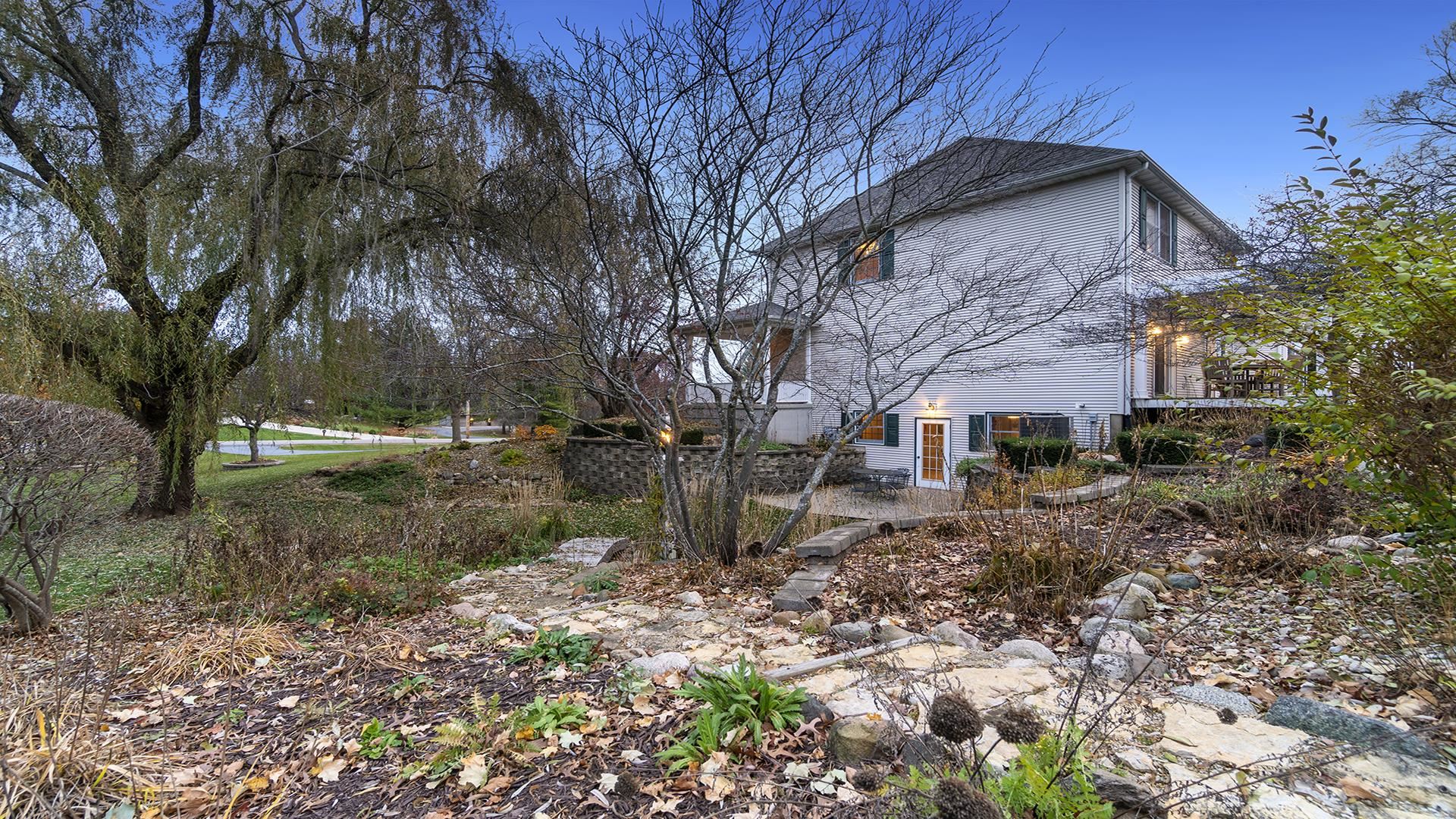 1921 Wildcat Road Dixon, IL 61021 - Photo 48 of 63 a view of a house with a yard