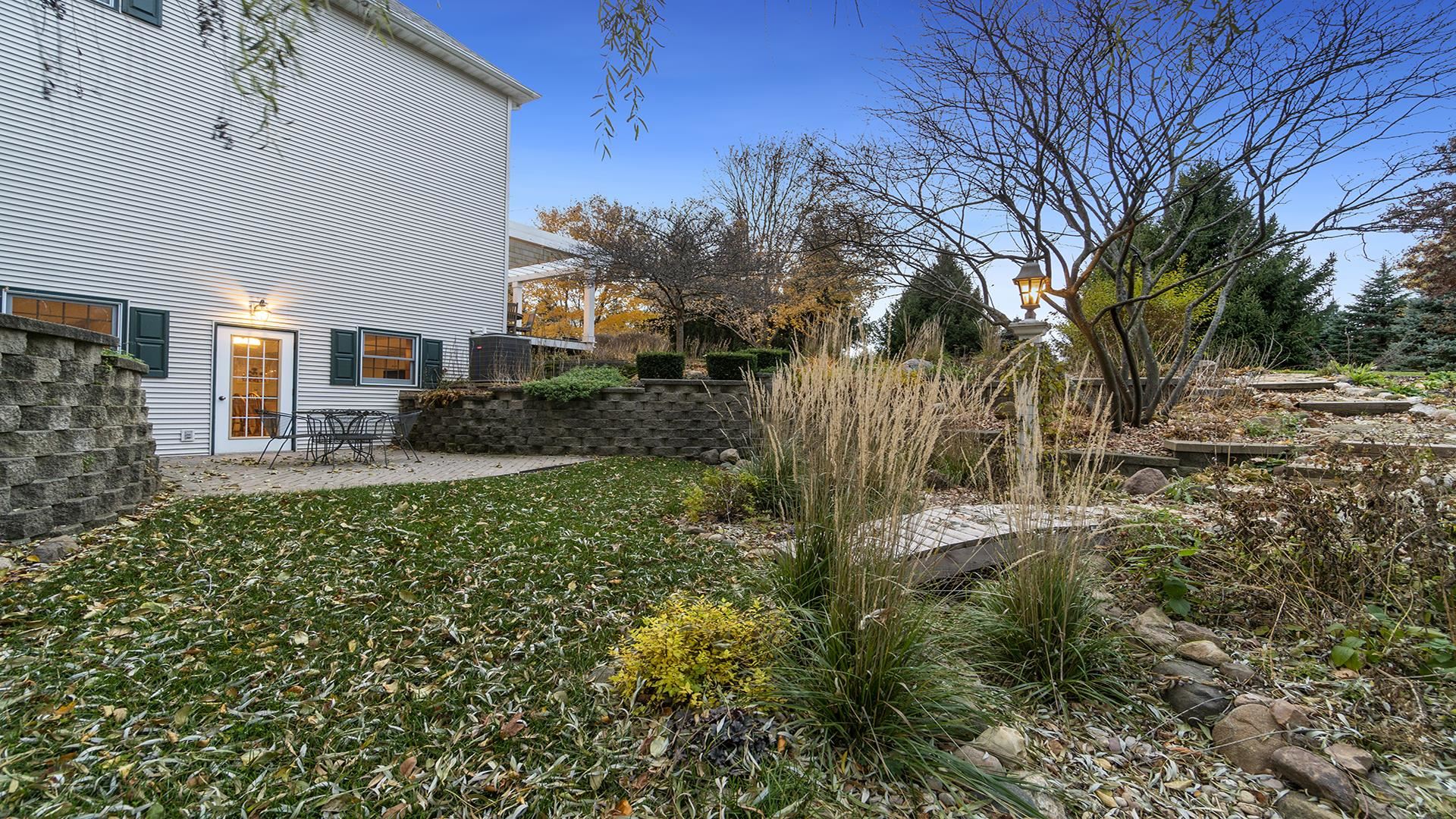 1921 Wildcat Road Dixon, IL 61021 - Photo 50 of 63 a front view of a house with a yard