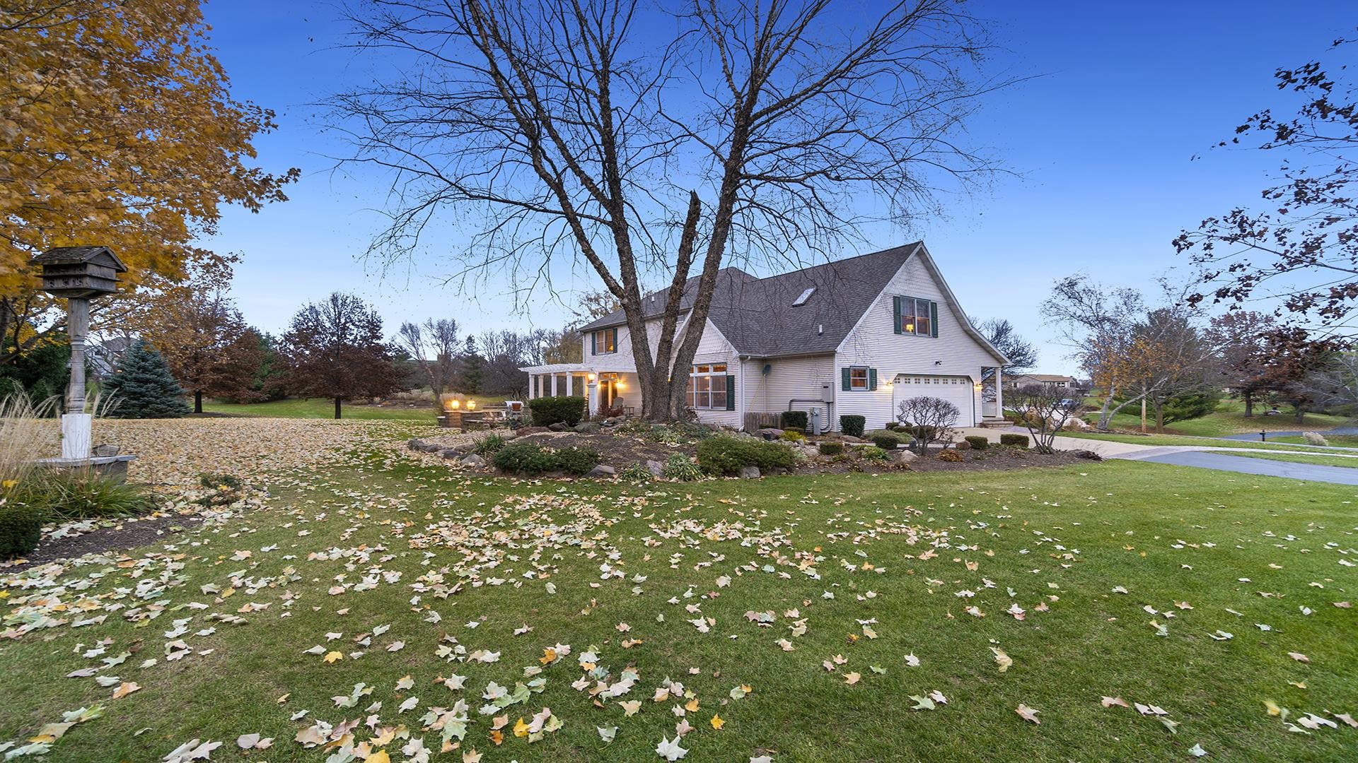 1921 Wildcat Road Dixon, IL 61021 - Photo 54 of 63 a front view of house with yard and green space