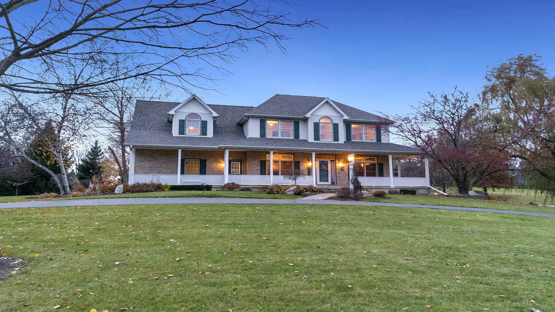 1921 Wildcat Road Dixon, IL 61021 - Photo 56 of 63 a front view of a building with a garden