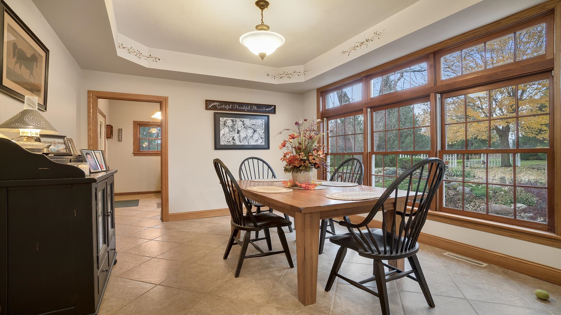 1921 Wildcat Road Dixon, IL 61021 - Photo 6 of 63 a view of a dining room with furniture window and wooden floor