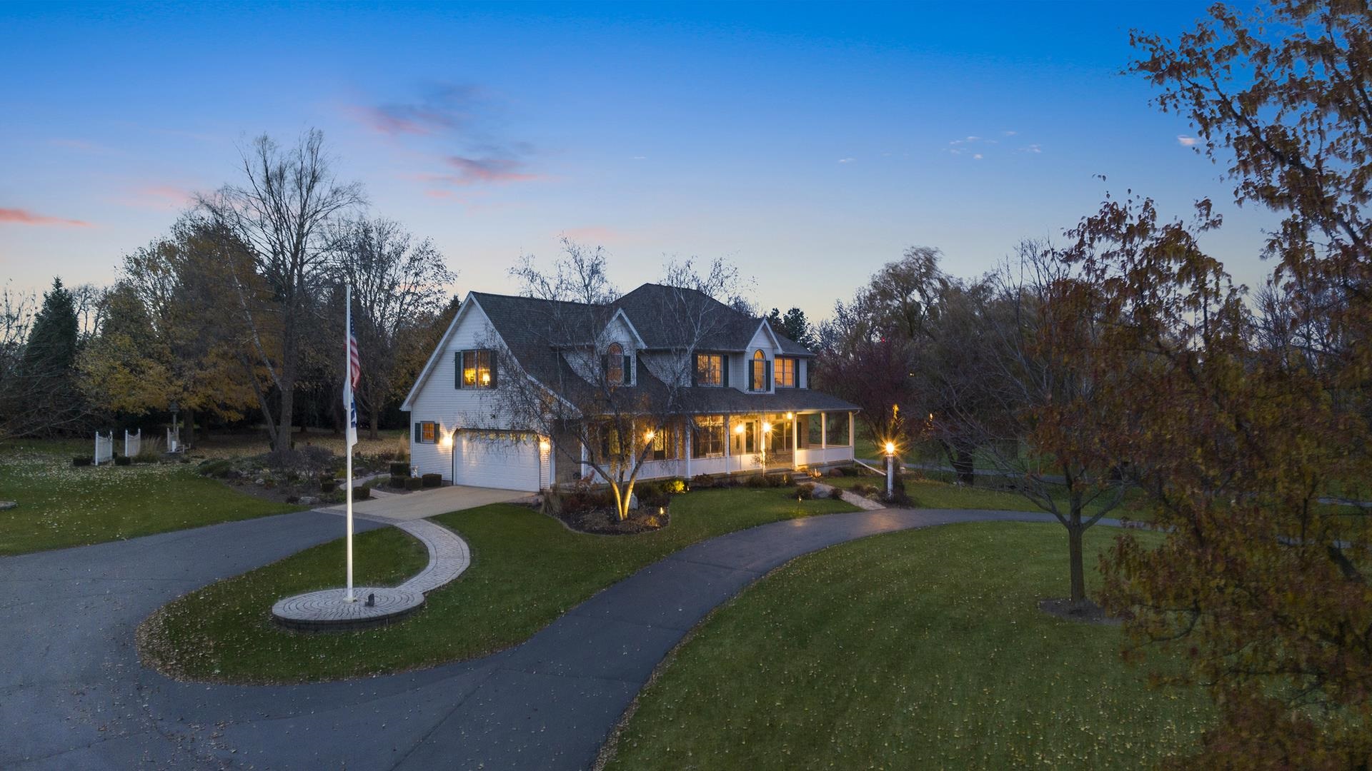 1921 Wildcat Road Dixon, IL 61021 - Photo 62 of 63 a front view of a house with a yard