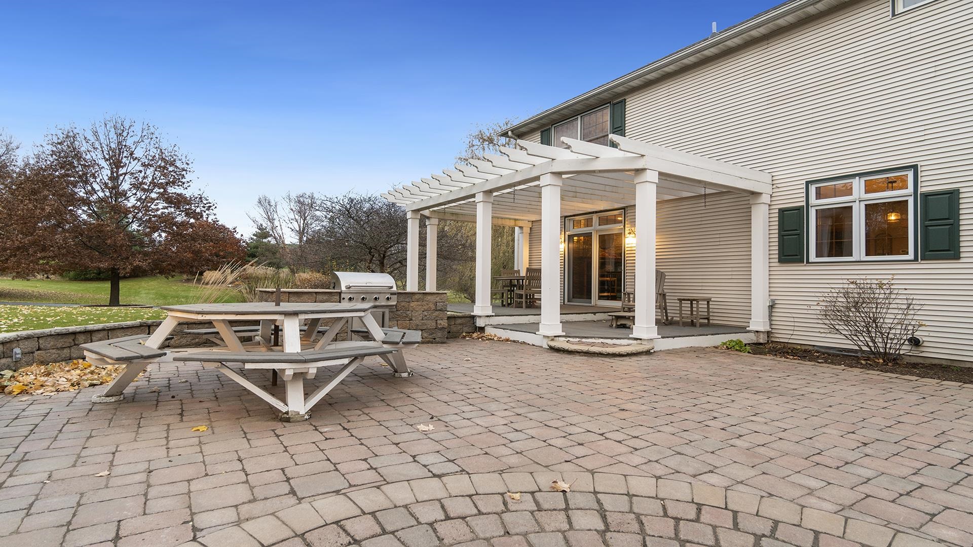 1921 Wildcat Road Dixon, IL 61021 - Photo 7 of 63 a view of a house with backyard porch and sitting area