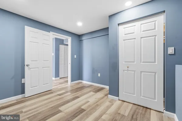 a view of a livingroom with wooden floor