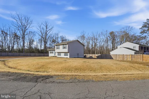 a house with trees in front of it