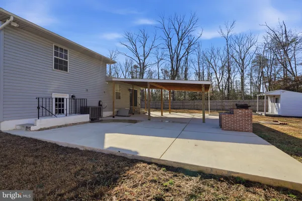 a view of a house with entertaining space