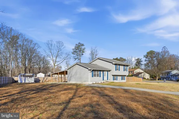 a view of a town with large trees
