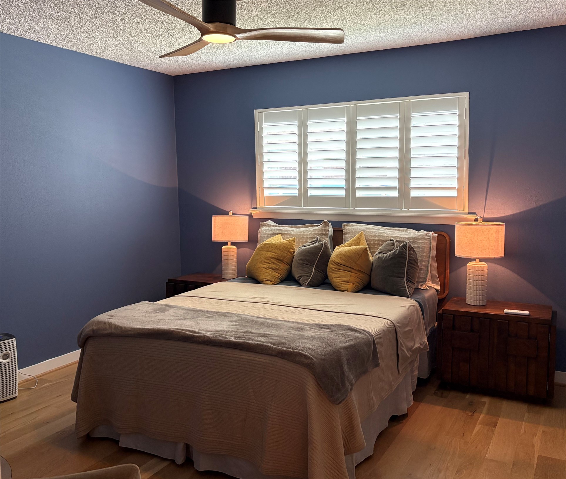 5626 Jason Street Houston, TX 77096 - Photo 10 of 13 a bedroom with a bed and window