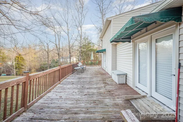 a view of a patio with wooden floor