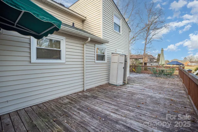 a view of a house with a roof deck