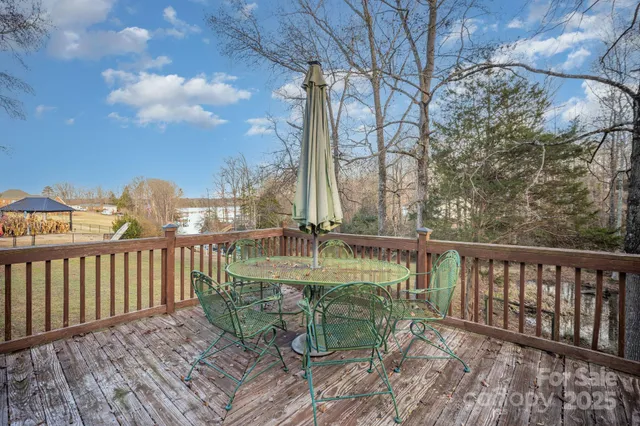 a view of balcony with furniture