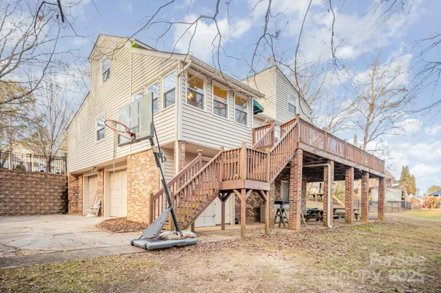 a view of a white building among the street