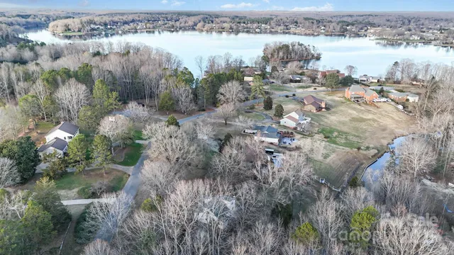 a view of lake with residential houses with outdoor space