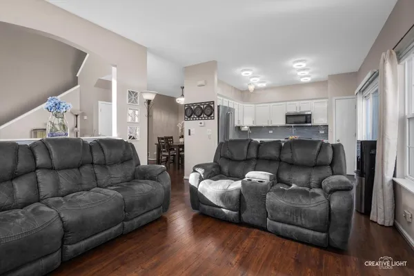 a living room with furniture and a couch