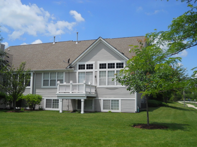 338 Quarry Ridge Circle Sugar Grove, IL 60554 - Photo 2 of 22 a aerial view of house with a yard