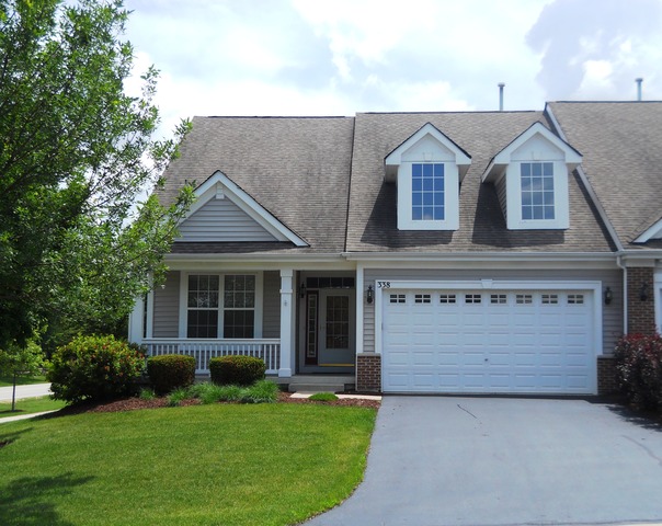 338 Quarry Ridge Circle Sugar Grove, IL 60554 - Photo 19 of 22 front view of a house with a yard