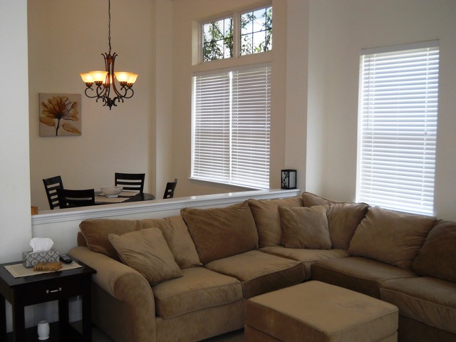 338 Quarry Ridge Circle Sugar Grove, IL 60554 - Photo 7 of 22 a living room with furniture a bed and a chandelier