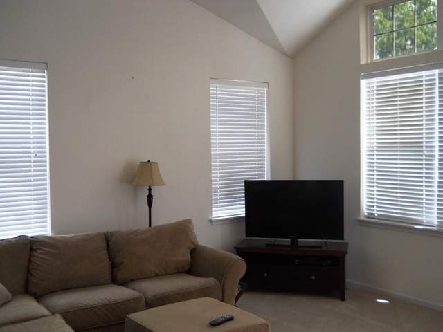 338 Quarry Ridge Circle Sugar Grove, IL 60554 - Photo 8 of 22 a living room with furniture and a flat screen tv