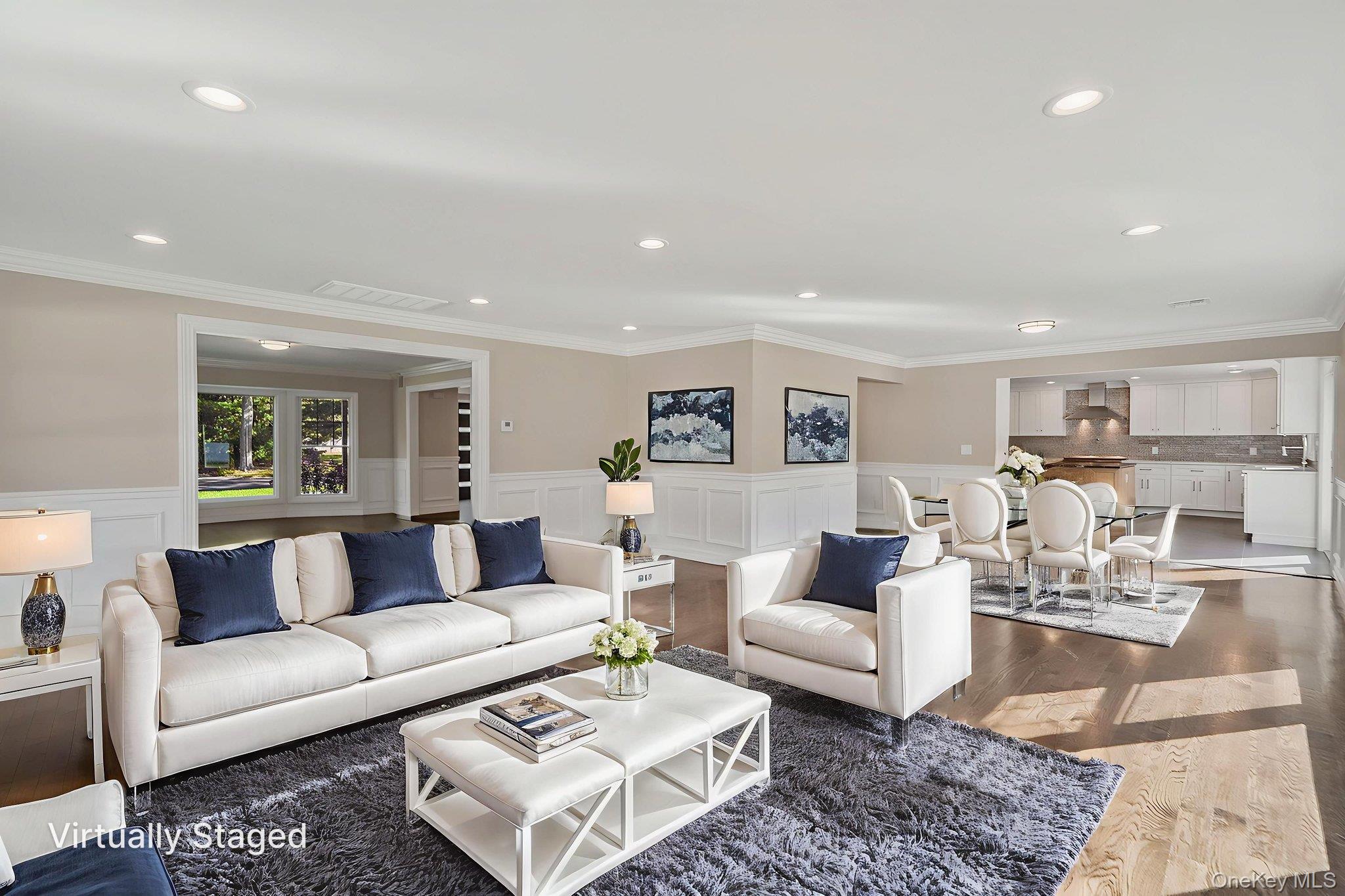 14 Quintree Lane Melville, NY 11747 - Photo 12 of 46 a living room with furniture and view of kitchen