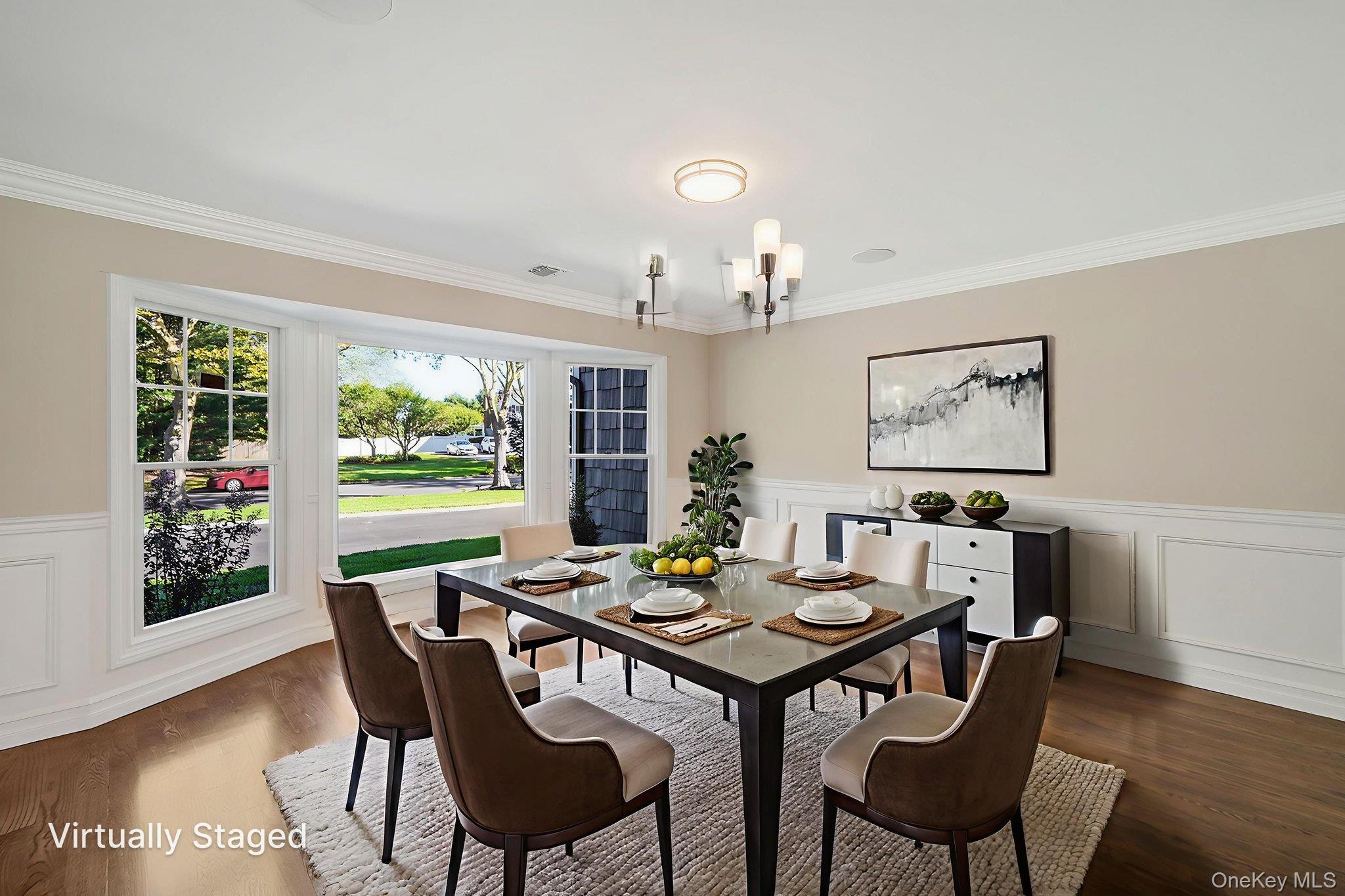 14 Quintree Lane Melville, NY 11747 - Photo 13 of 46 a view of a dining room with furniture and wooden floor