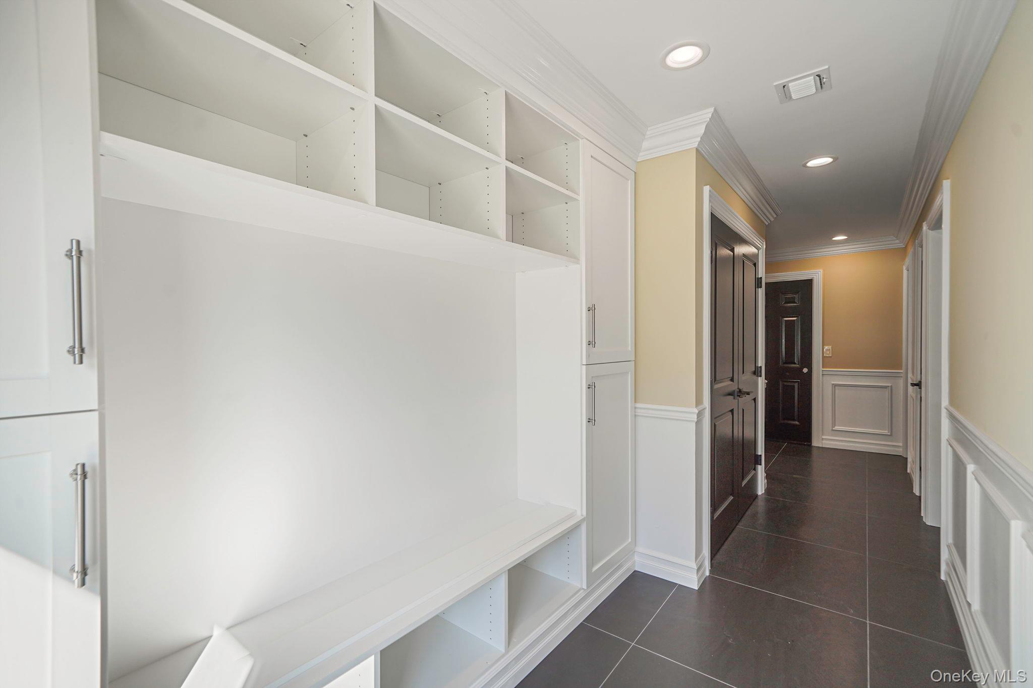 14 Quintree Lane Melville, NY 11747 - Photo 21 of 46 a view of hallway with walk in closet