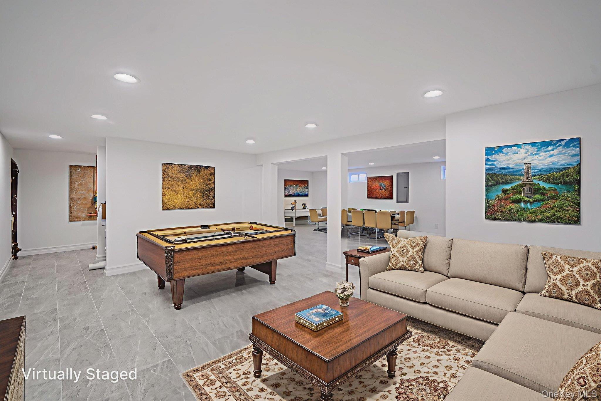 14 Quintree Lane Melville, NY 11747 - Photo 42 of 46 a living room with furniture a rug and a wall painting