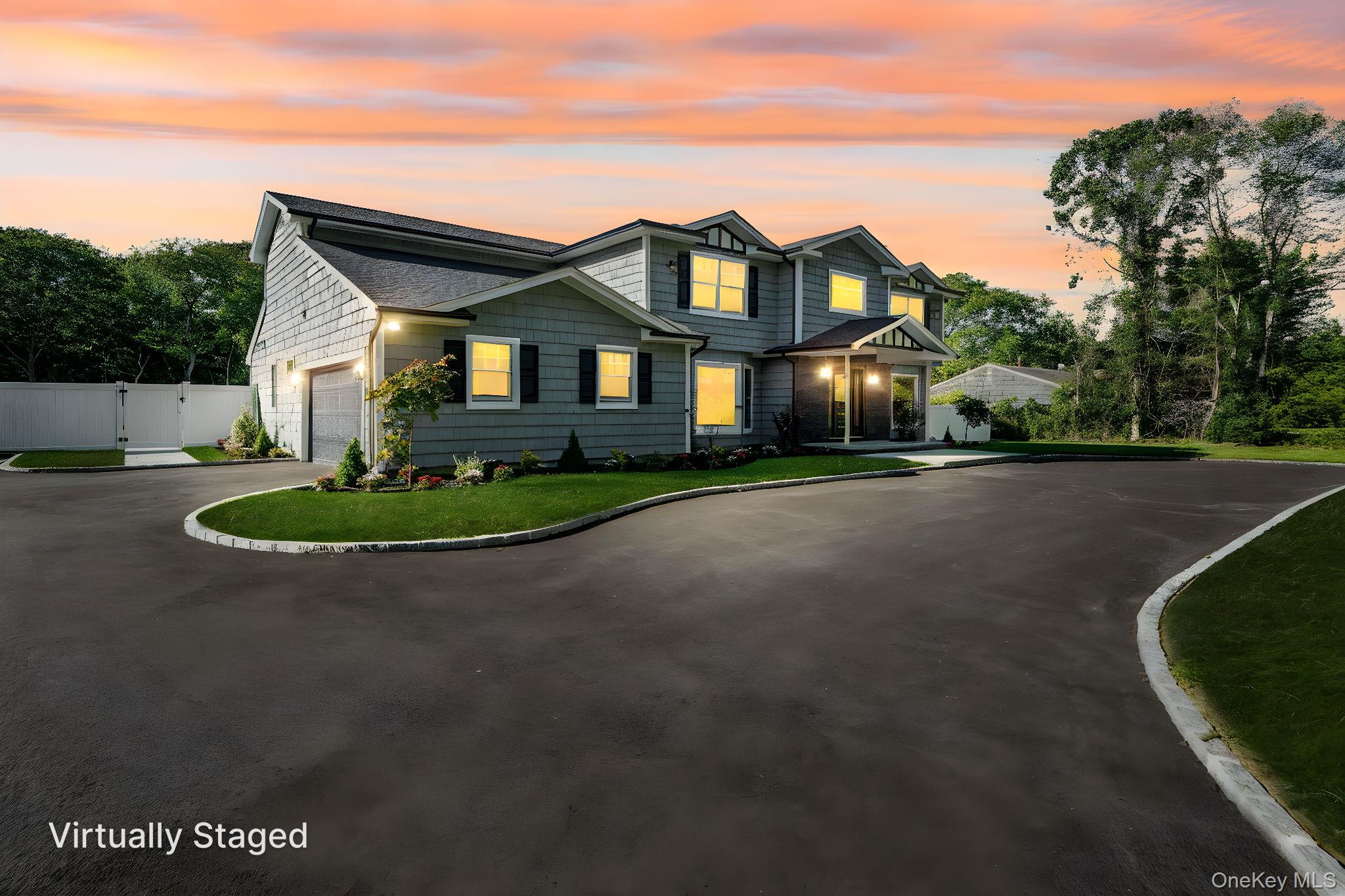14 Quintree Lane Melville, NY 11747 - Photo 45 of 46 a front view of a house with a yard
