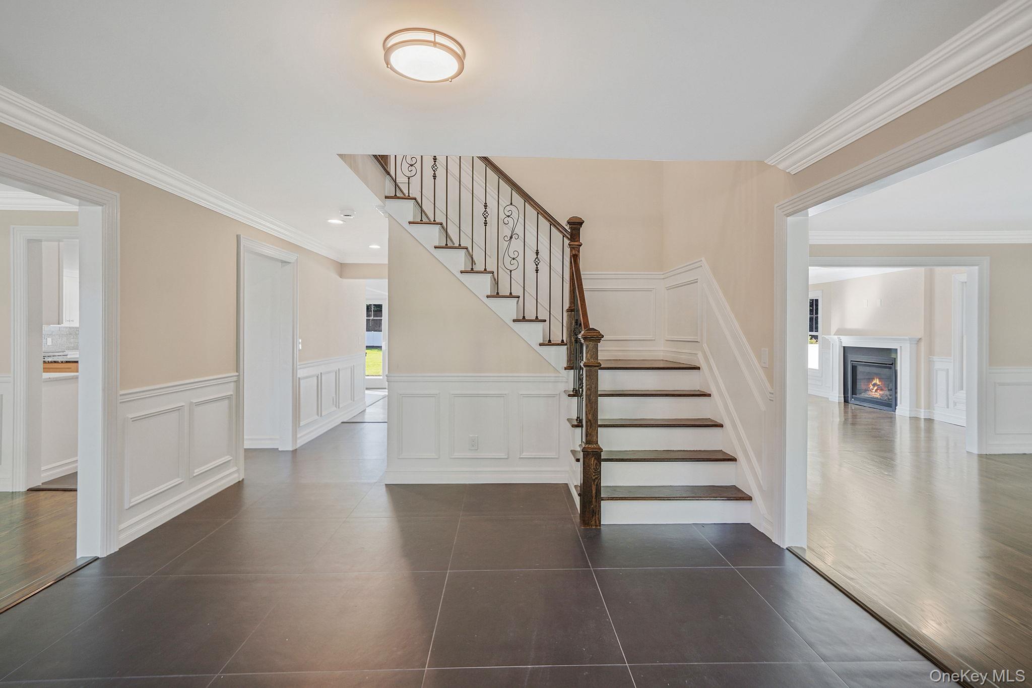 14 Quintree Lane Melville, NY 11747 - Photo 5 of 46 a view of entryway and hall with wooden floor