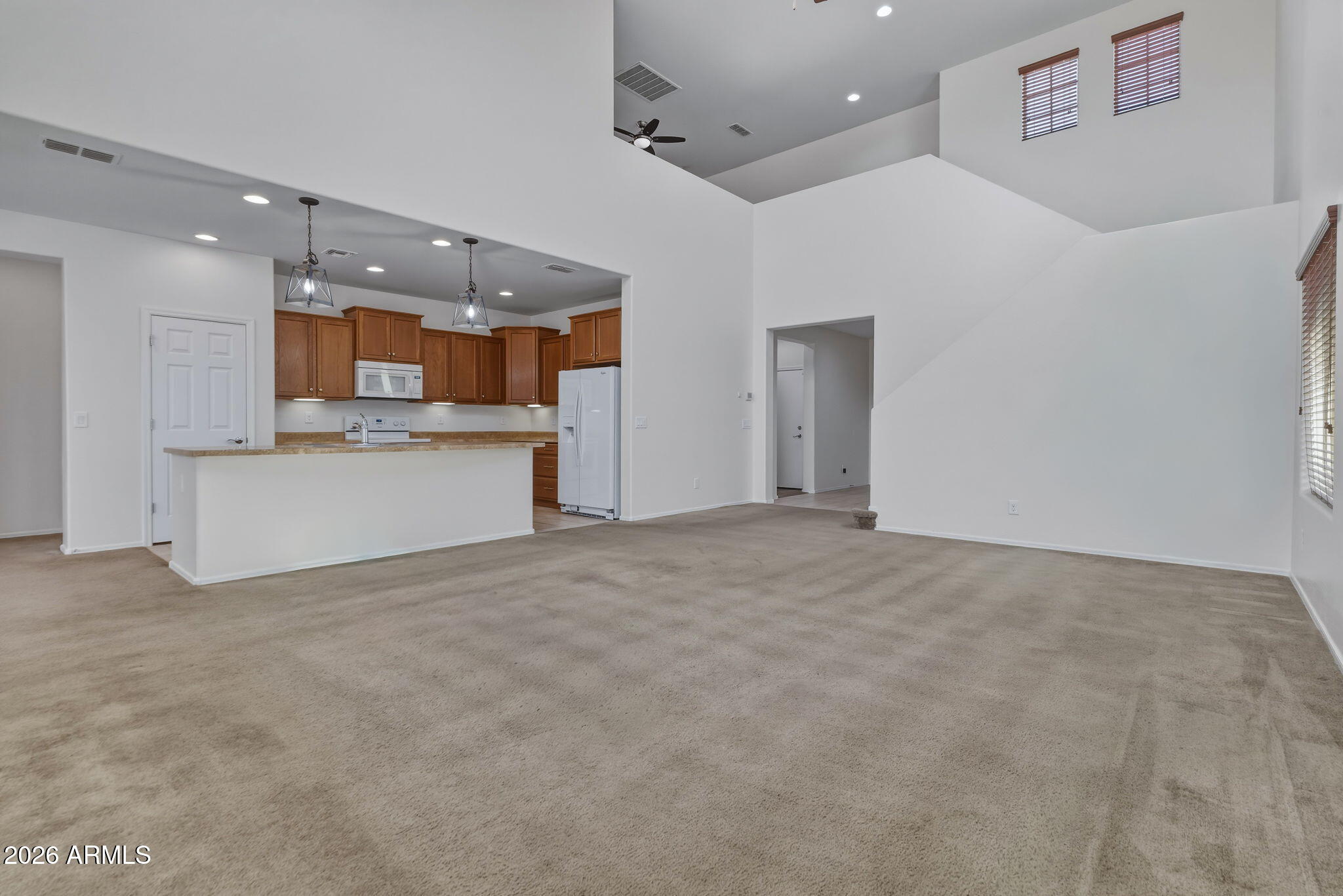 17543 West Buckhorn Trail Surprise, AZ 85387 - Photo 11 of 104 Great Room and Kitchen