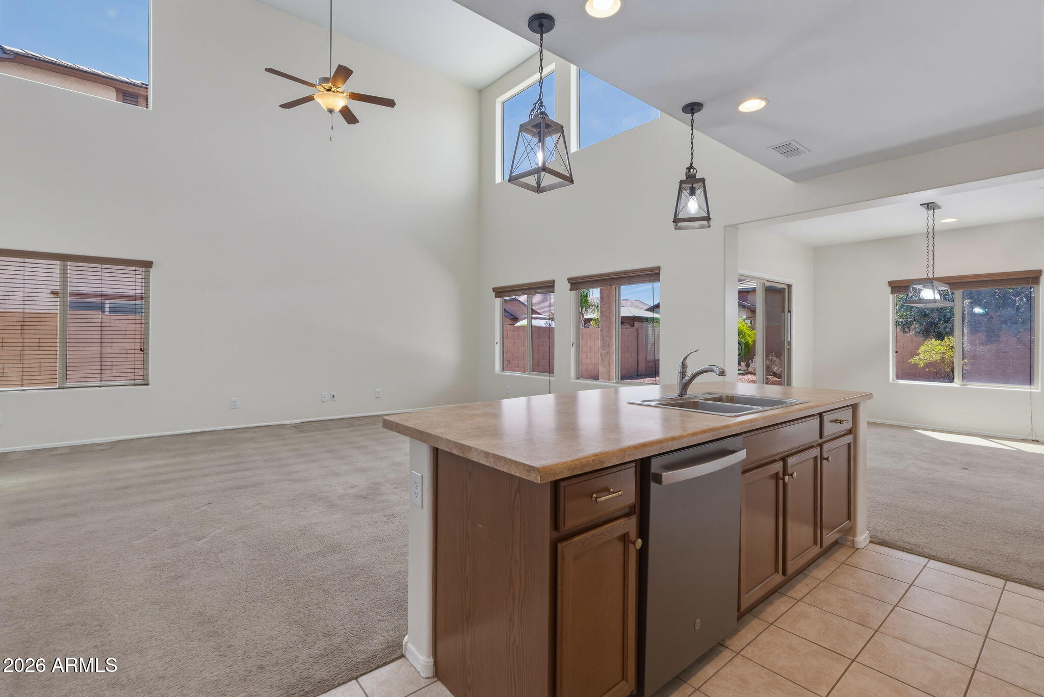 17543 West Buckhorn Trail Surprise, AZ 85387 - Photo 20 of 104 a kitchen with a sink and cabinets