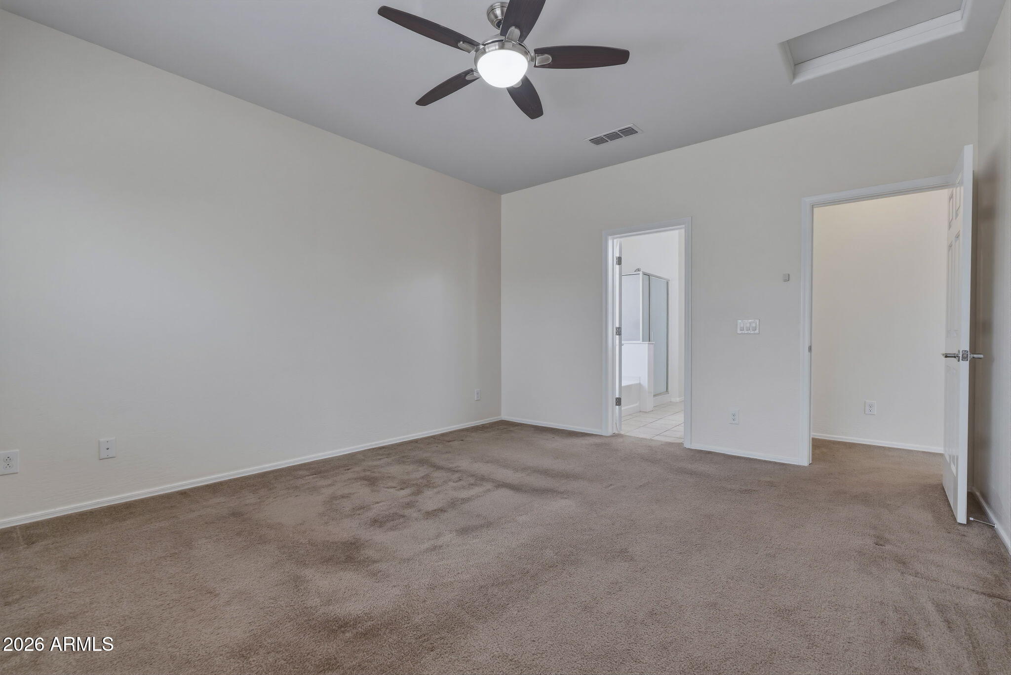 17543 West Buckhorn Trail Surprise, AZ 85387 - Photo 33 of 104 a view of an empty room and chandelier fan