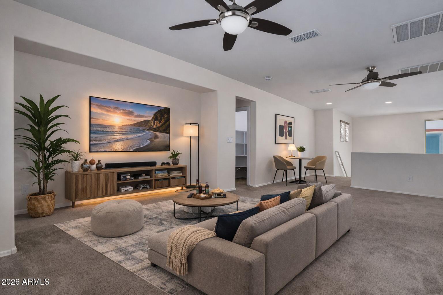 17543 West Buckhorn Trail Surprise, AZ 85387 - Photo 45 of 104 a living room with furniture and a flat screen tv with wooden floor