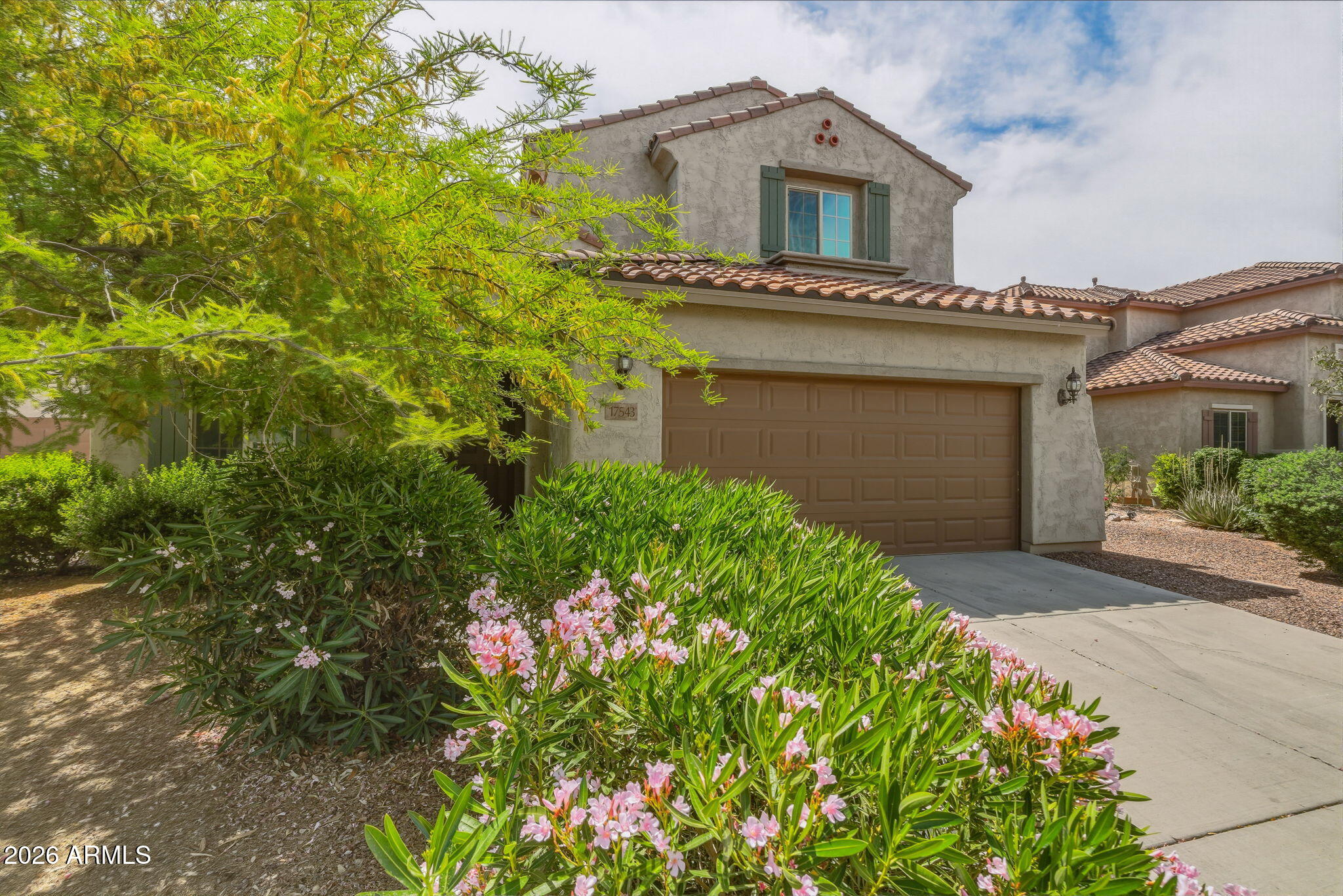 17543 West Buckhorn Trail Surprise, AZ 85387 - Photo 3 of 104 front view of a house with a yard