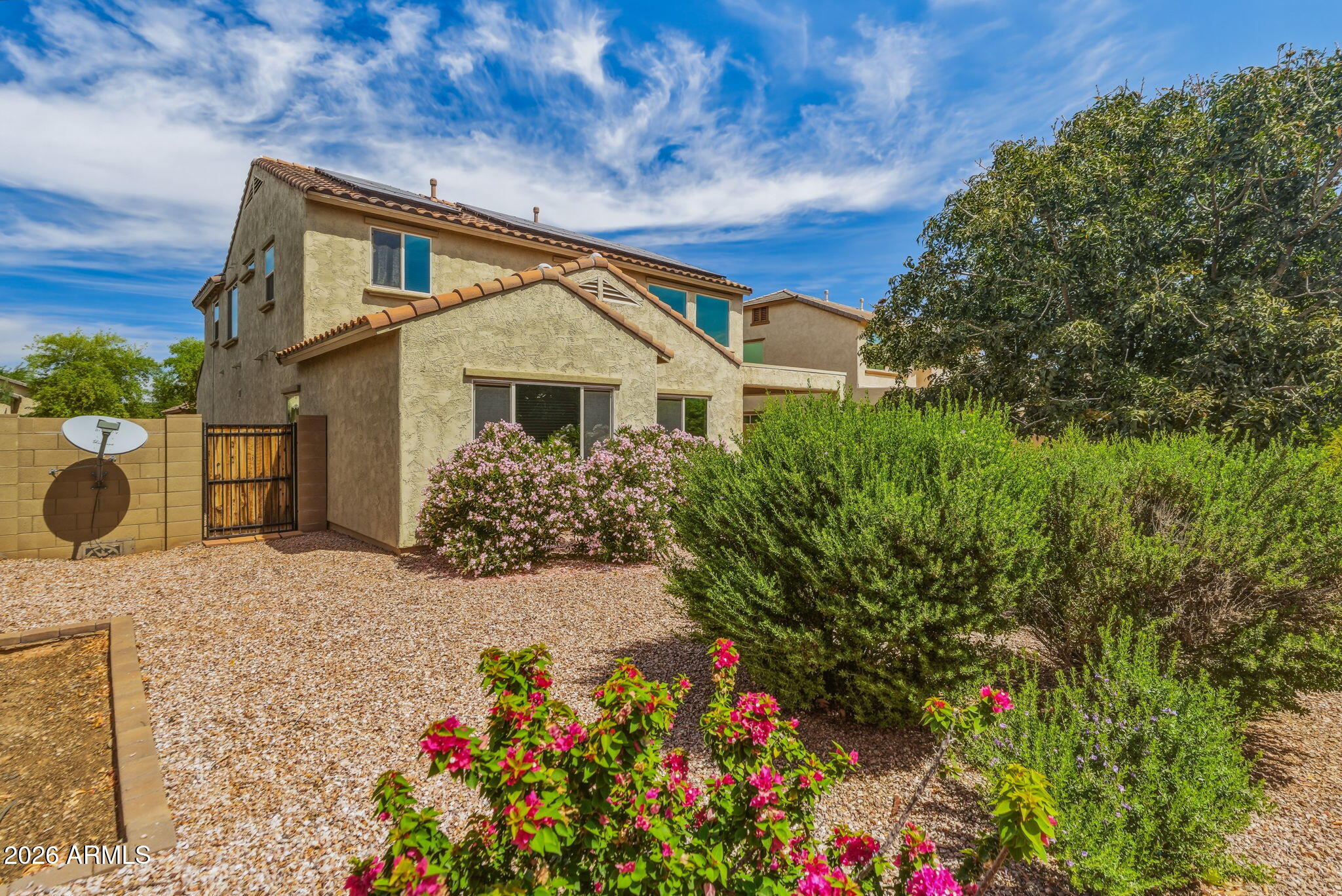 17543 West Buckhorn Trail Surprise, AZ 85387 - Photo 63 of 104 a front view of a house with a yard