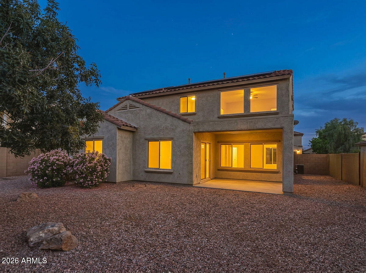 17543 West Buckhorn Trail Surprise, AZ 85387 - Photo 68 of 104 Back of Home Twilight
