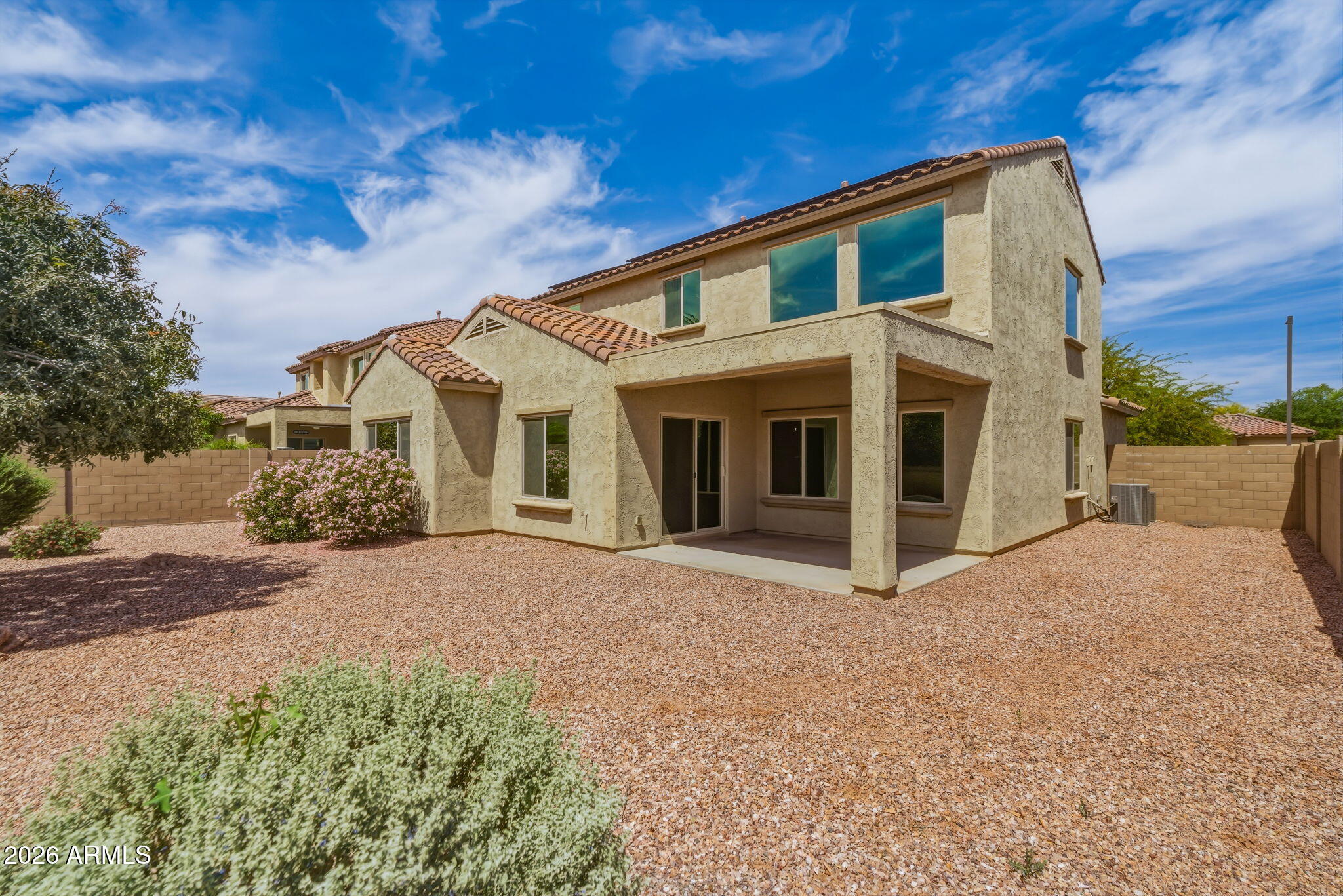 17543 West Buckhorn Trail Surprise, AZ 85387 - Photo 69 of 104 a front view of a house with a yard