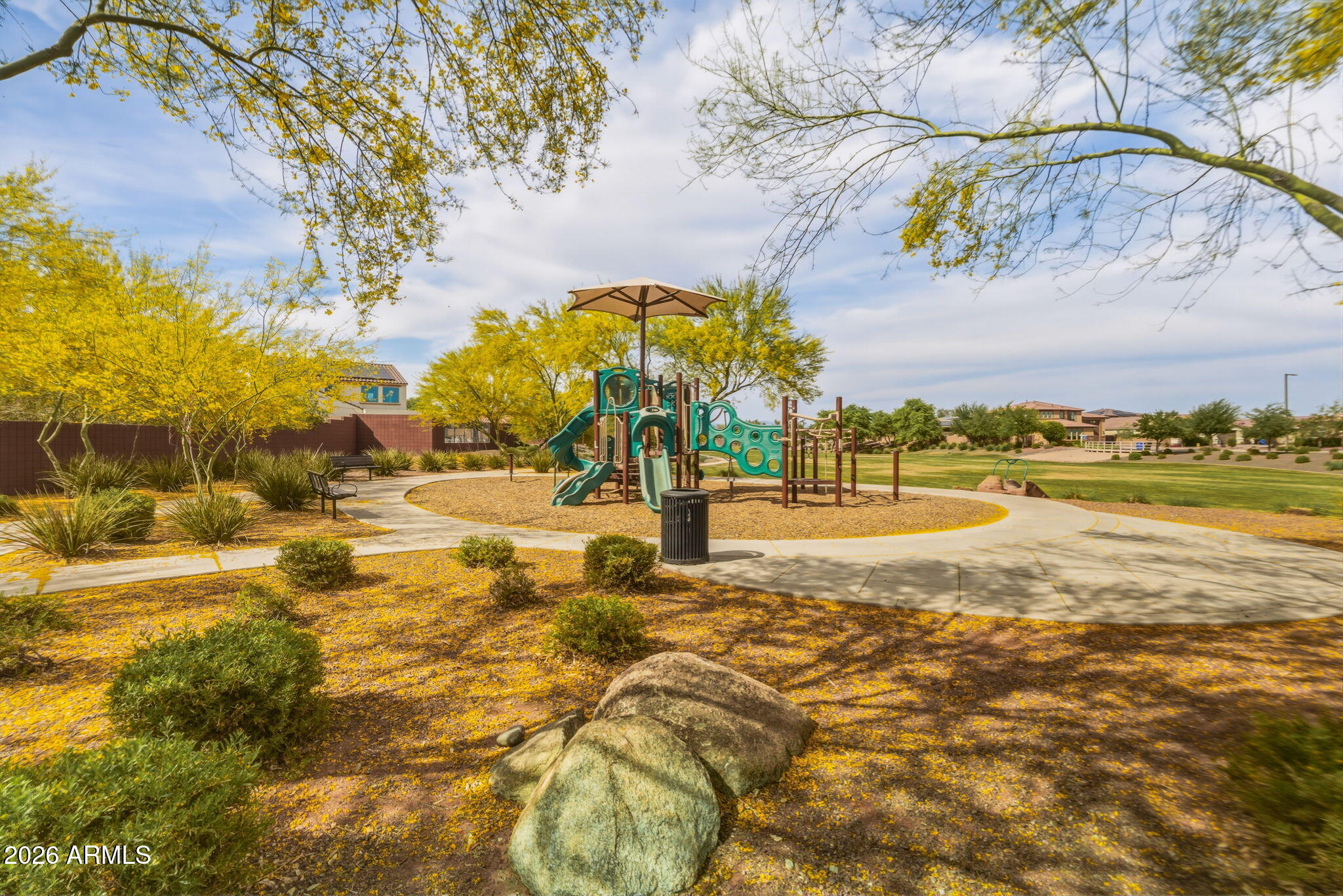17543 West Buckhorn Trail Surprise, AZ 85387 - Photo 76 of 104 a view of an ocean with a building in the background