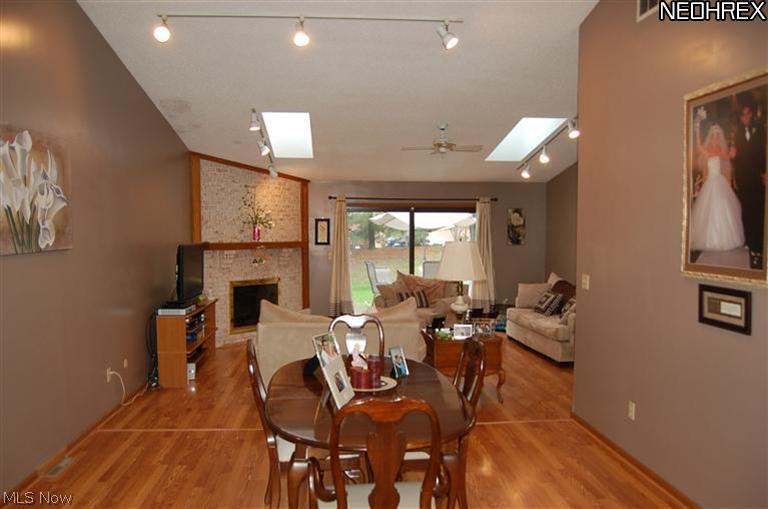 1260 Boardman-Canfield Road, Unit J27 Youngstown, OH 44512 - Photo 4 of 9 Cathedral dining room & great room