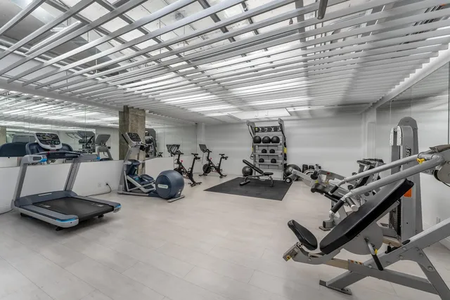 a view of a room with gym equipment