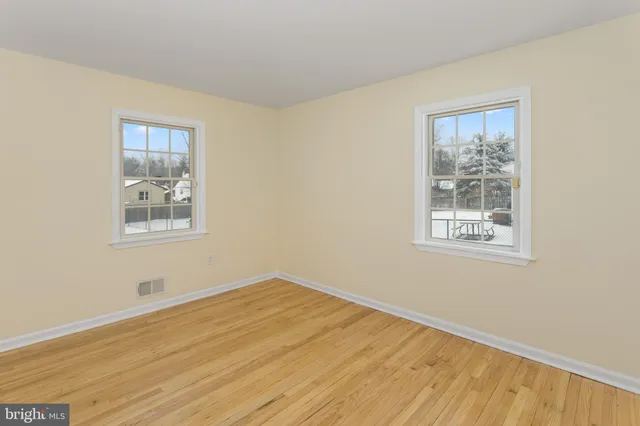 a bathroom with a sink mirror toilet and shower