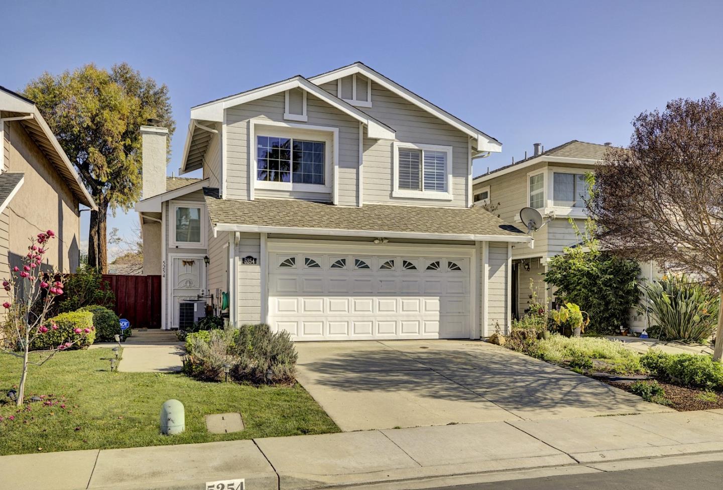 5254 Country Forge Lane San Jose, CA 95136 - Photo 1 of 1 a front view of a house with garden