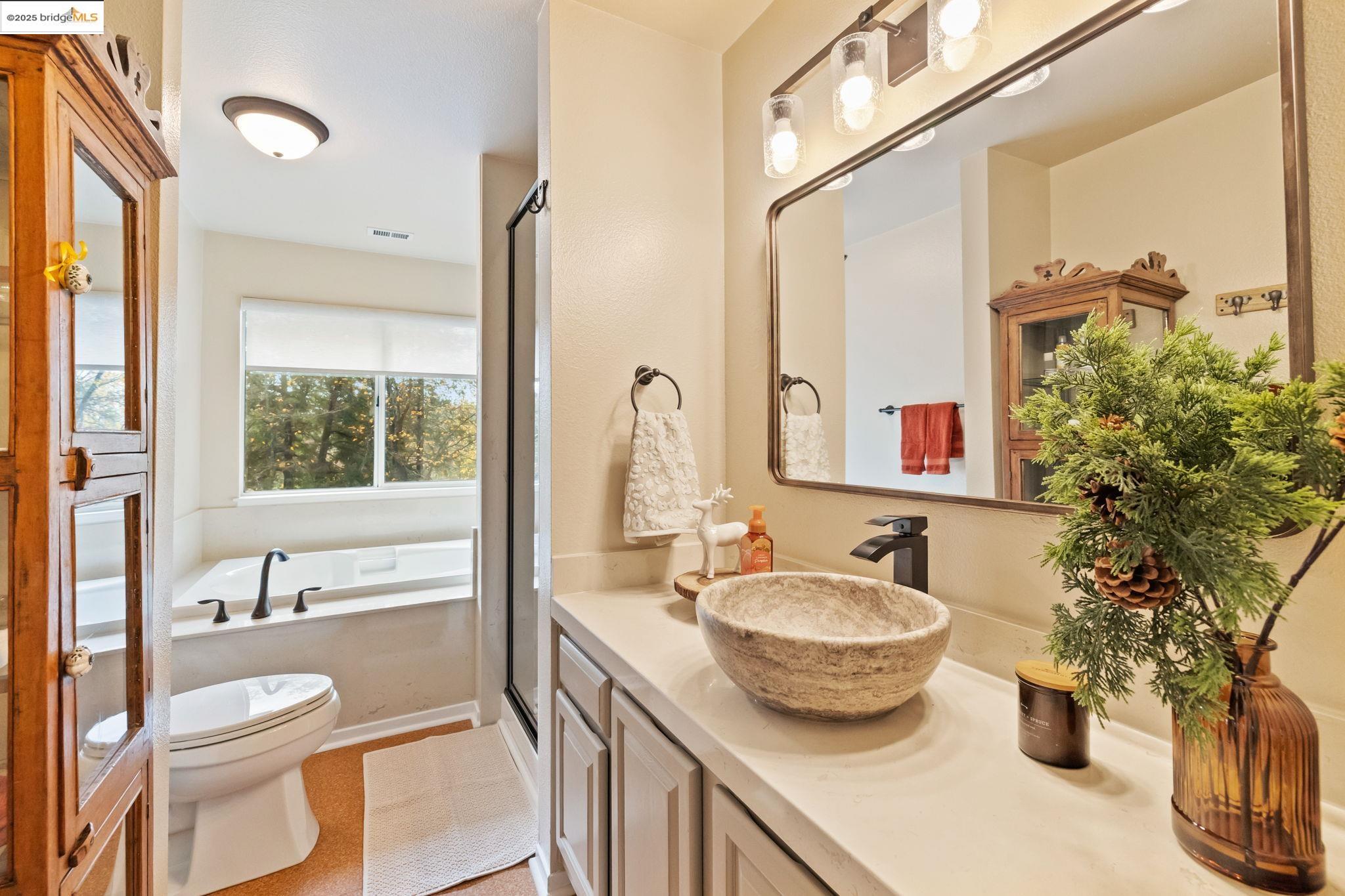 18080 Little Fuller Road Twain Harte, CA 95383 - Photo 17 of 40 Bathroom featuring vanity and a garden tub