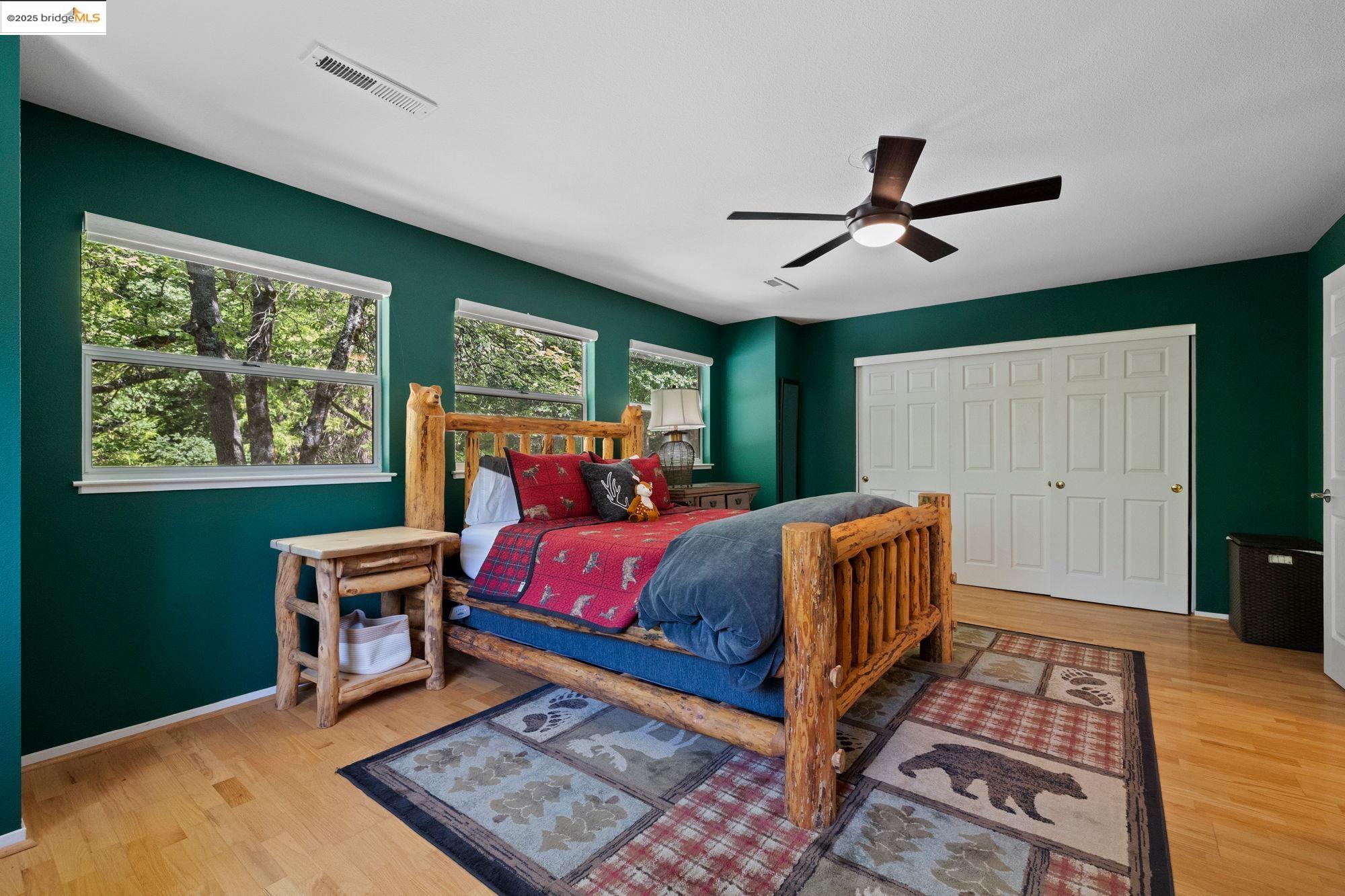 18080 Little Fuller Road Twain Harte, CA 95383 - Photo 20 of 40 Bedroom with a closet, light wood-style flooring, and ceiling fan