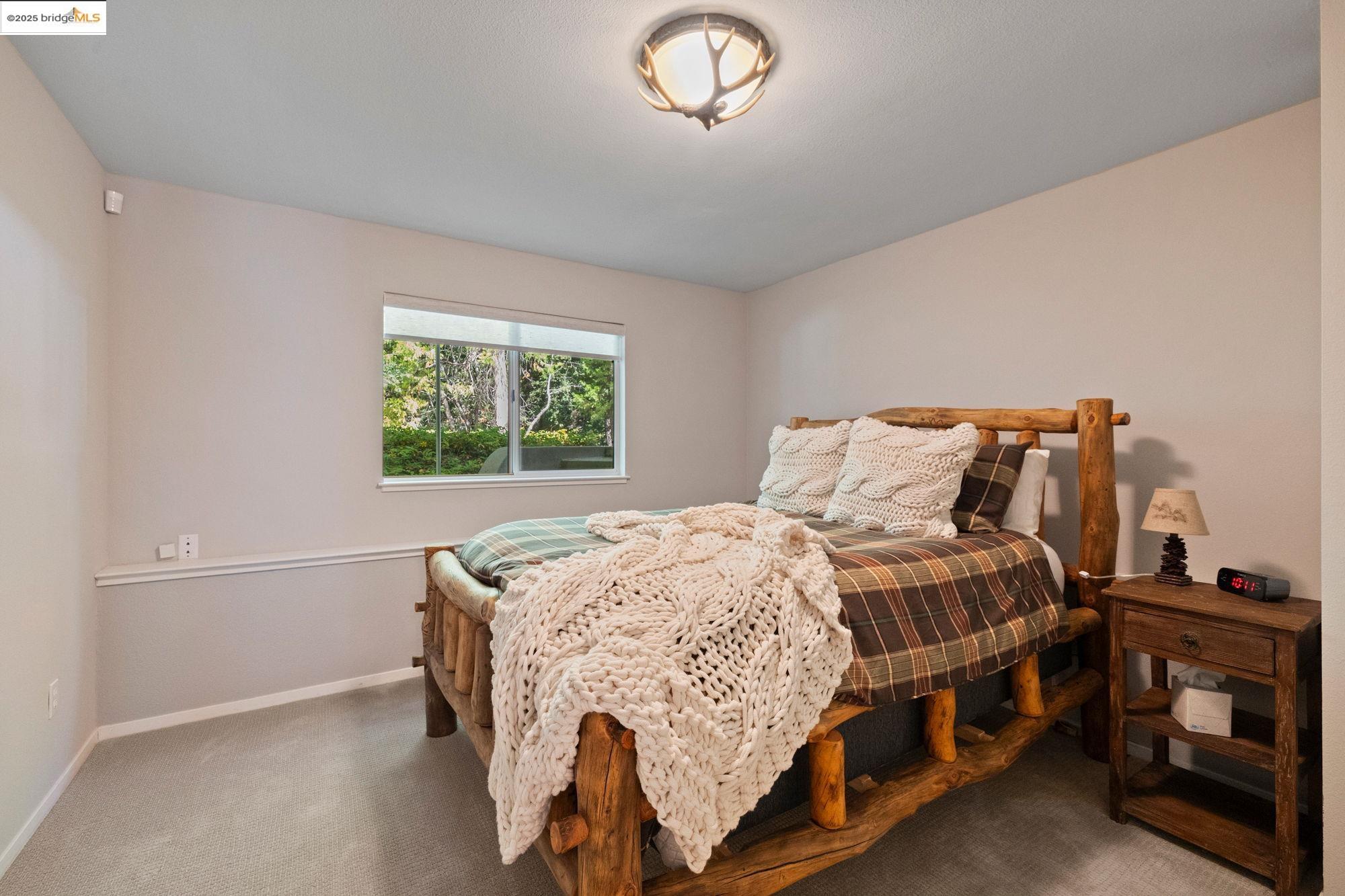 18080 Little Fuller Road Twain Harte, CA 95383 - Photo 23 of 40 Carpeted bedroom featuring baseboards