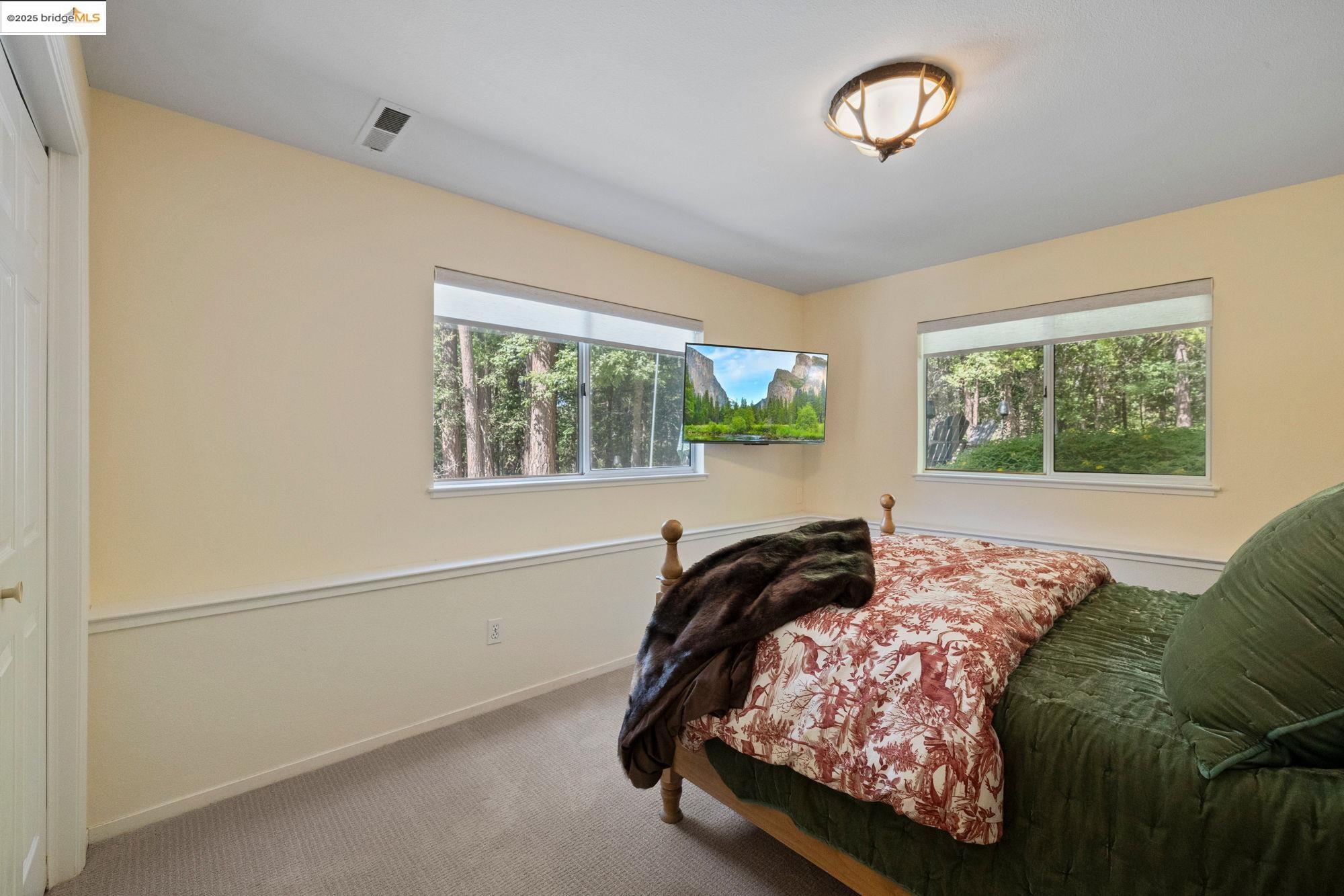 18080 Little Fuller Road Twain Harte, CA 95383 - Photo 24 of 40 Carpeted bedroom featuring baseboards